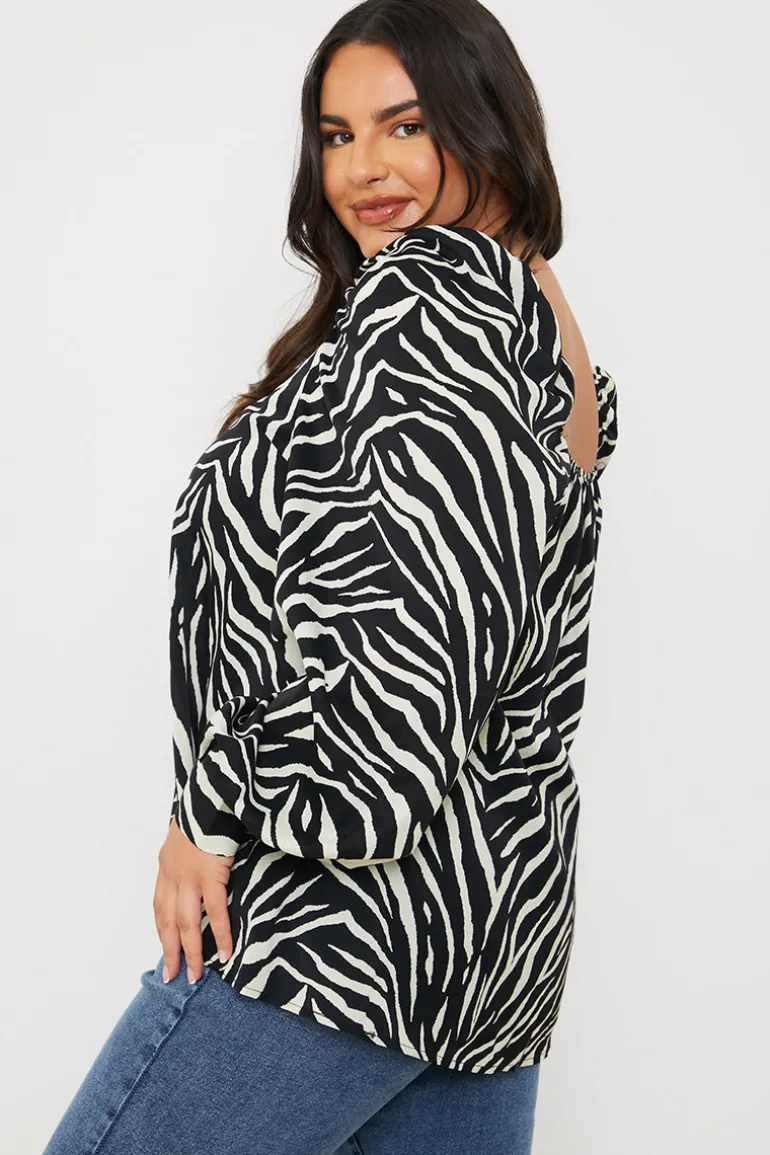 Zebra Woven Balloon Sleeve Blouse